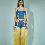 PANTALONE CON VOLANT
