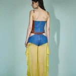 PANTALONE CON VOLANT